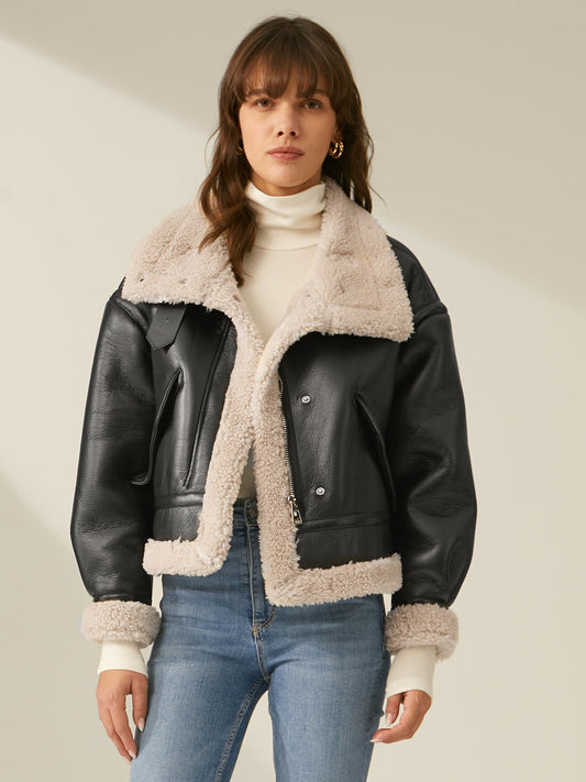 Black sherpa-lined flight jacket with stand collar and chest snap placket