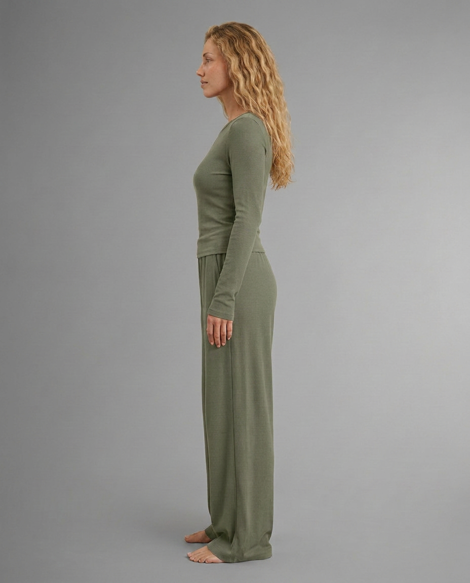 Two-piece lounge set in olive green, profile view: long-sleeve top with wide-leg trousers