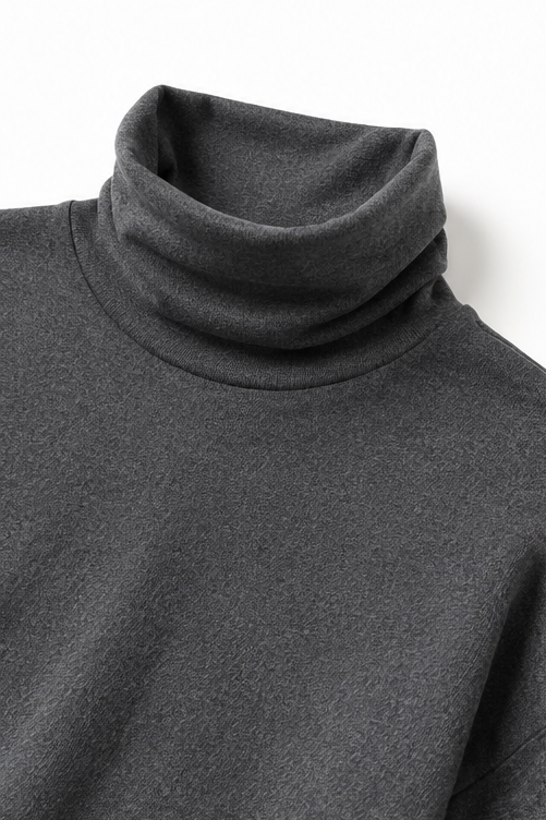 Dark grey turtleneck top with high cowl neckline and smooth knit texture