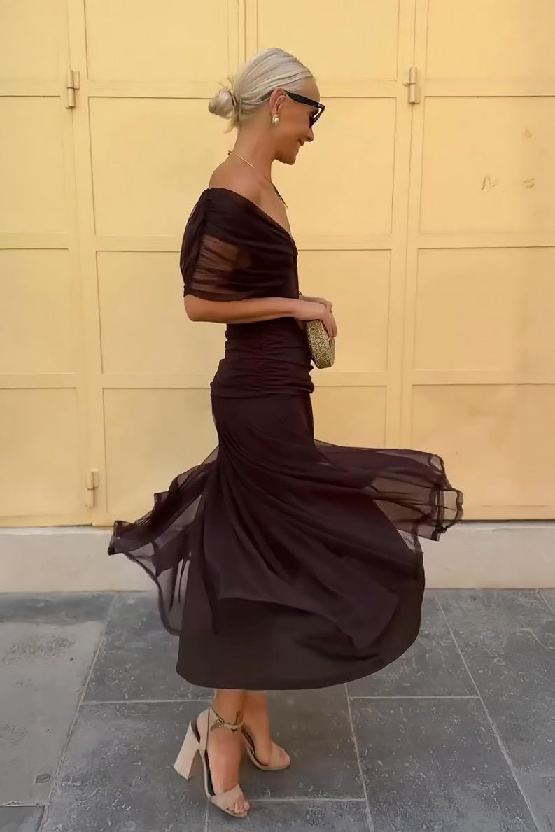 Dark brown twist off-shoulder maxi dress with layered tulle skirt and side view drape