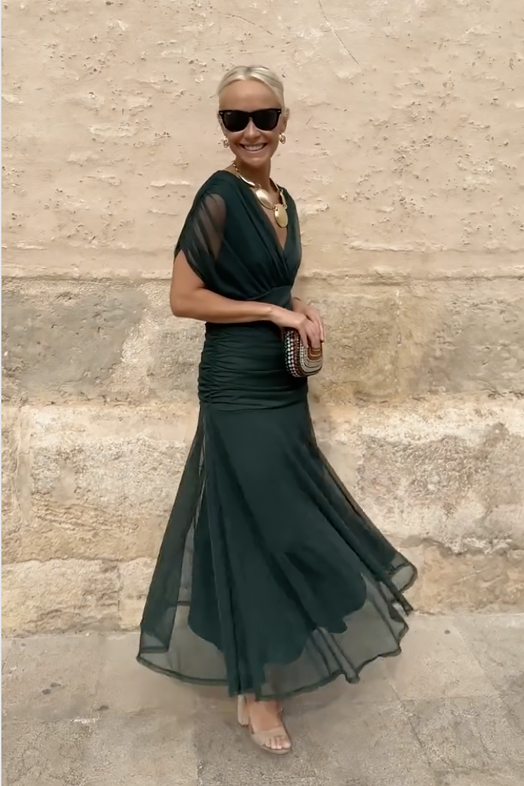 Green twist off-shoulder maxi dress with flowing chiffon skirt and draped waist