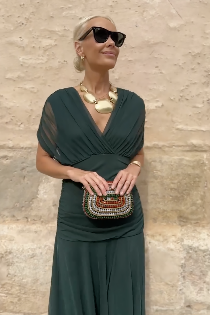 Green twist off-shoulder maxi dress with short sleeves and crossover V-neck