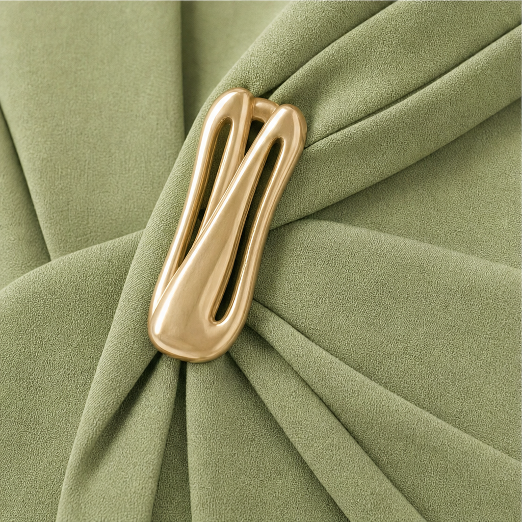 Gold-tone twisted waist buckle detail on sage green fabric