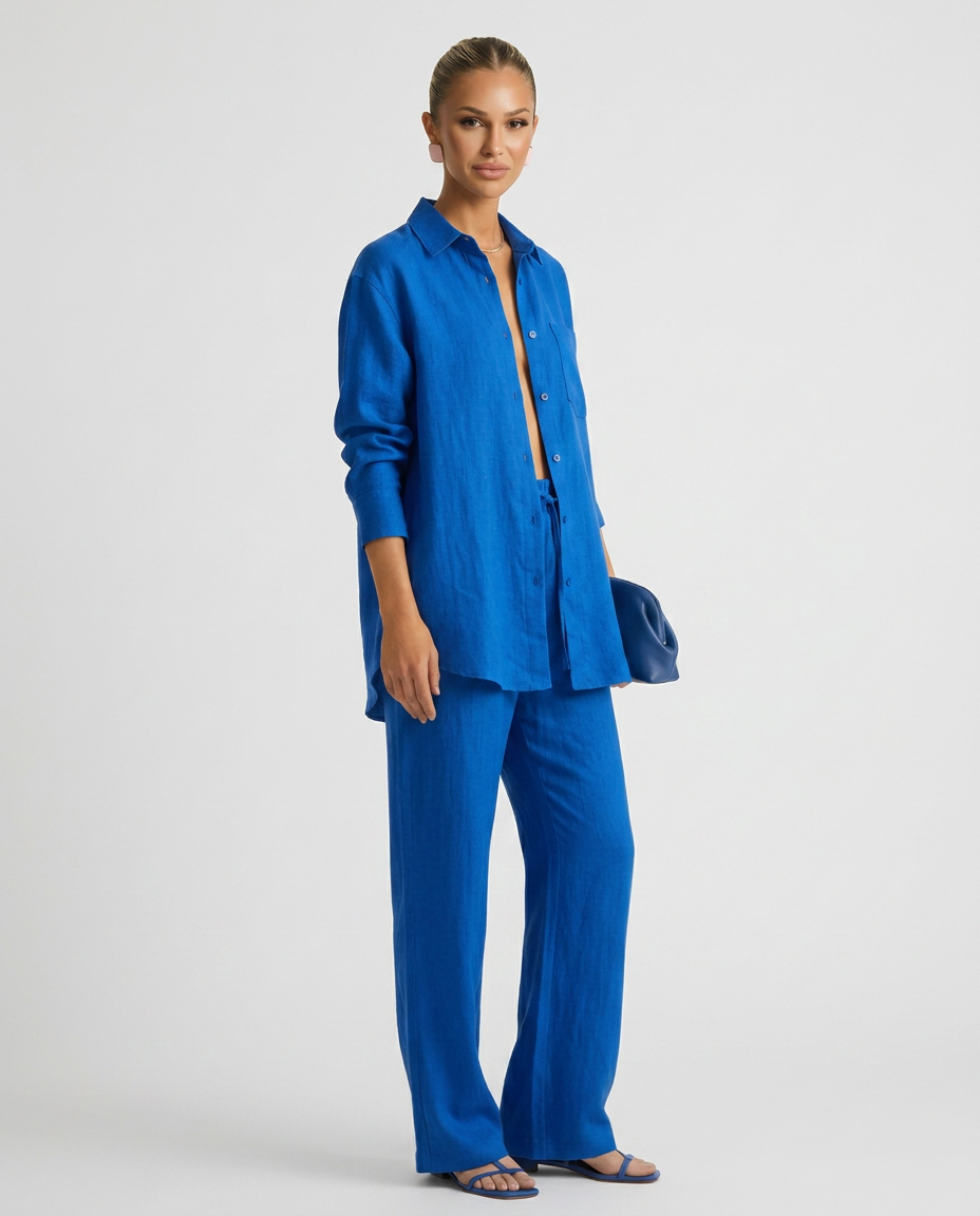 Blue relaxed button-up top and matching relaxed pants set, front view