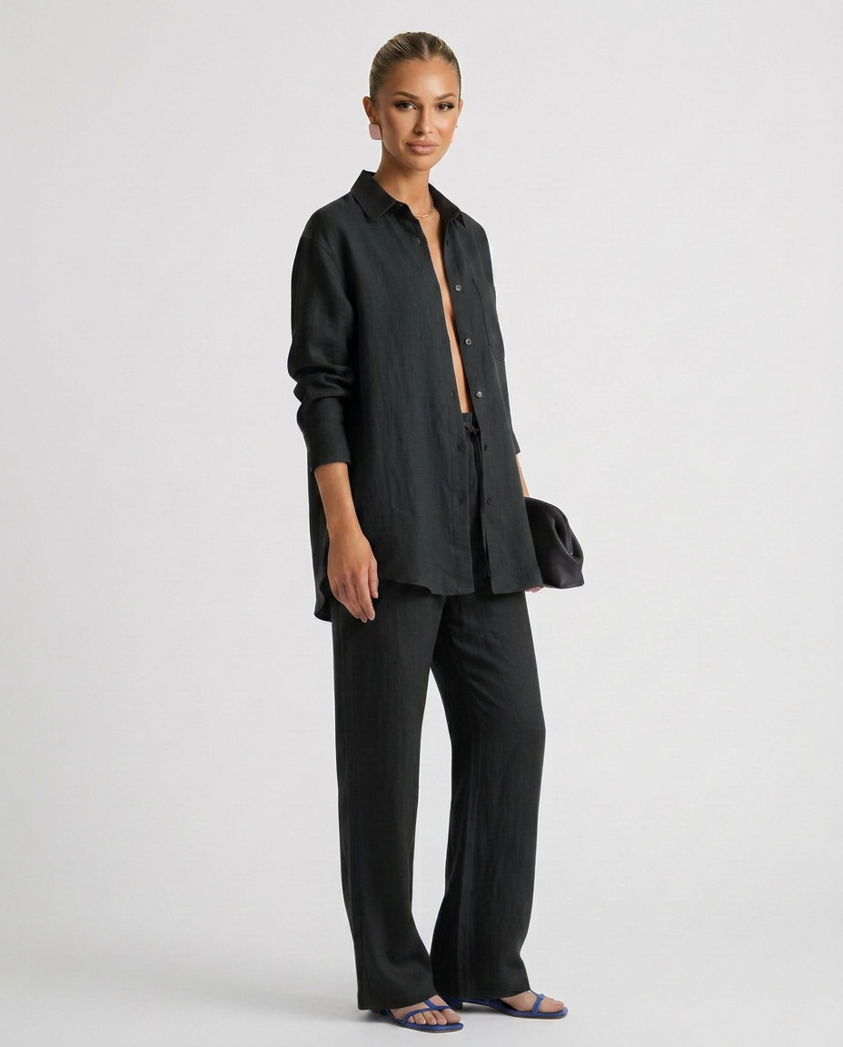 Black relaxed button-up top and matching relaxed pants set, front view