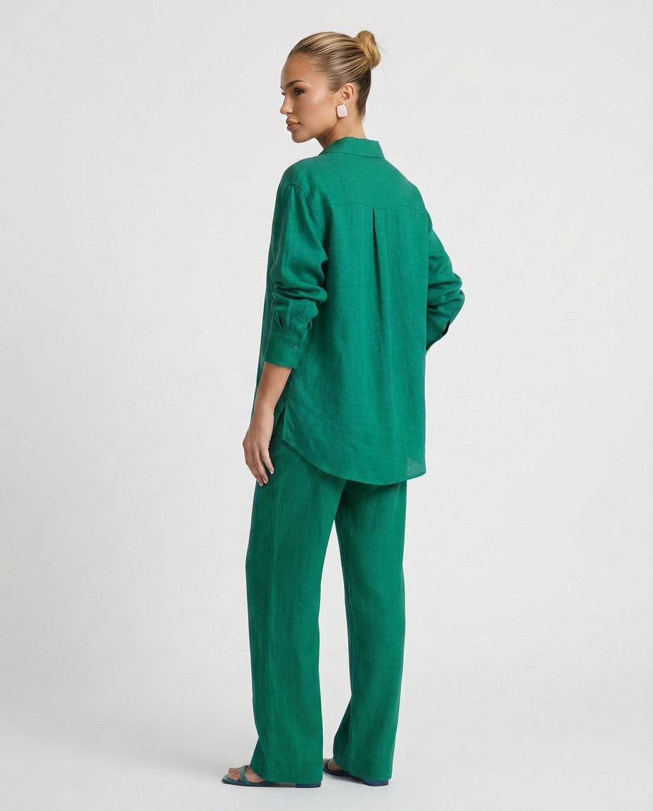 Green two-piece button-up set with long-sleeve shirt and relaxed matching pants