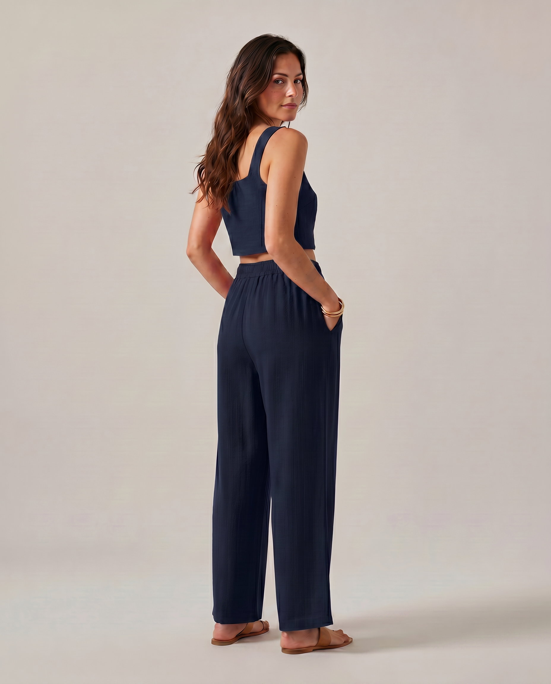 Navy wide-leg two-piece set with square-neck cropped tank and gathered elastic-waist pants.