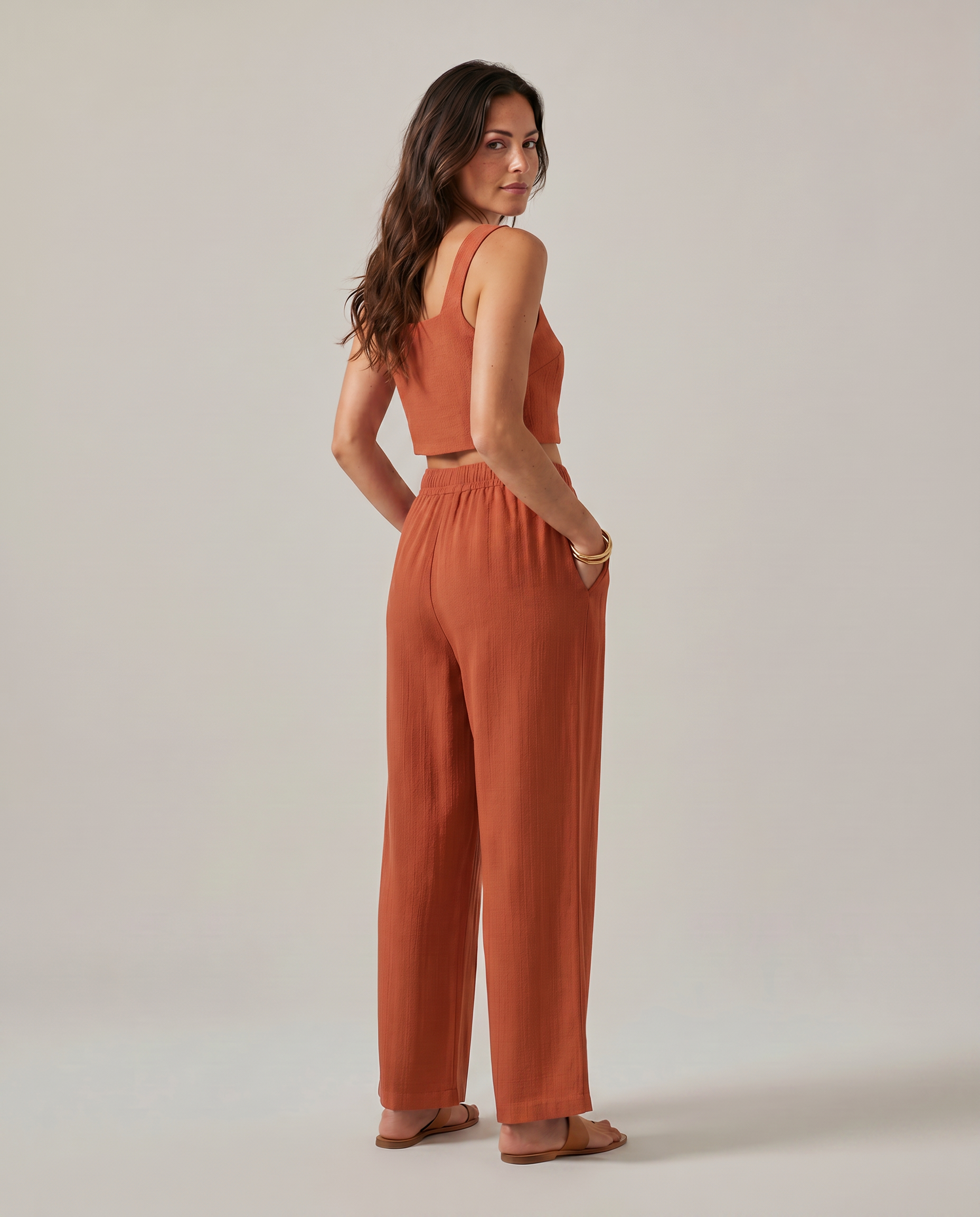Rust orange wide-leg set with square-neck tank and smocked-waist pants