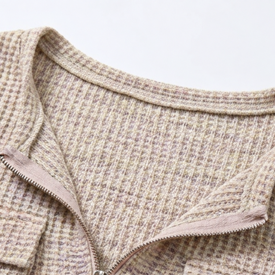 Beige waffle-knit half-zip V-neck with long sleeves and textured knit collar