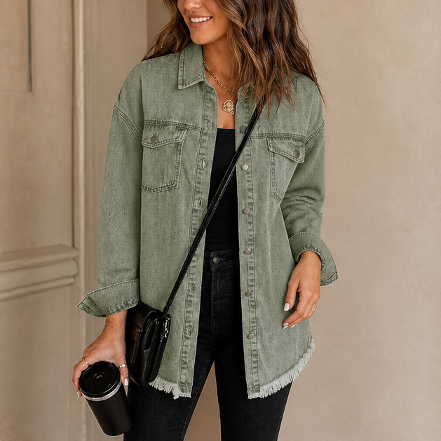 Washed green denim-look jacket with button front, chest pockets, and frayed hem