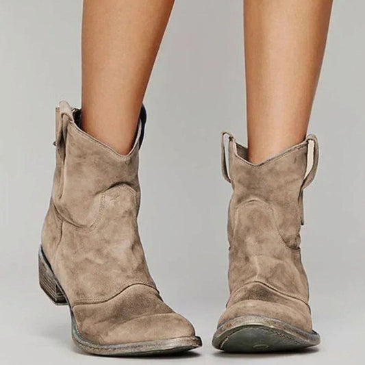 Brown suede western ankle boots with side pull tabs, stacked heel, round toe