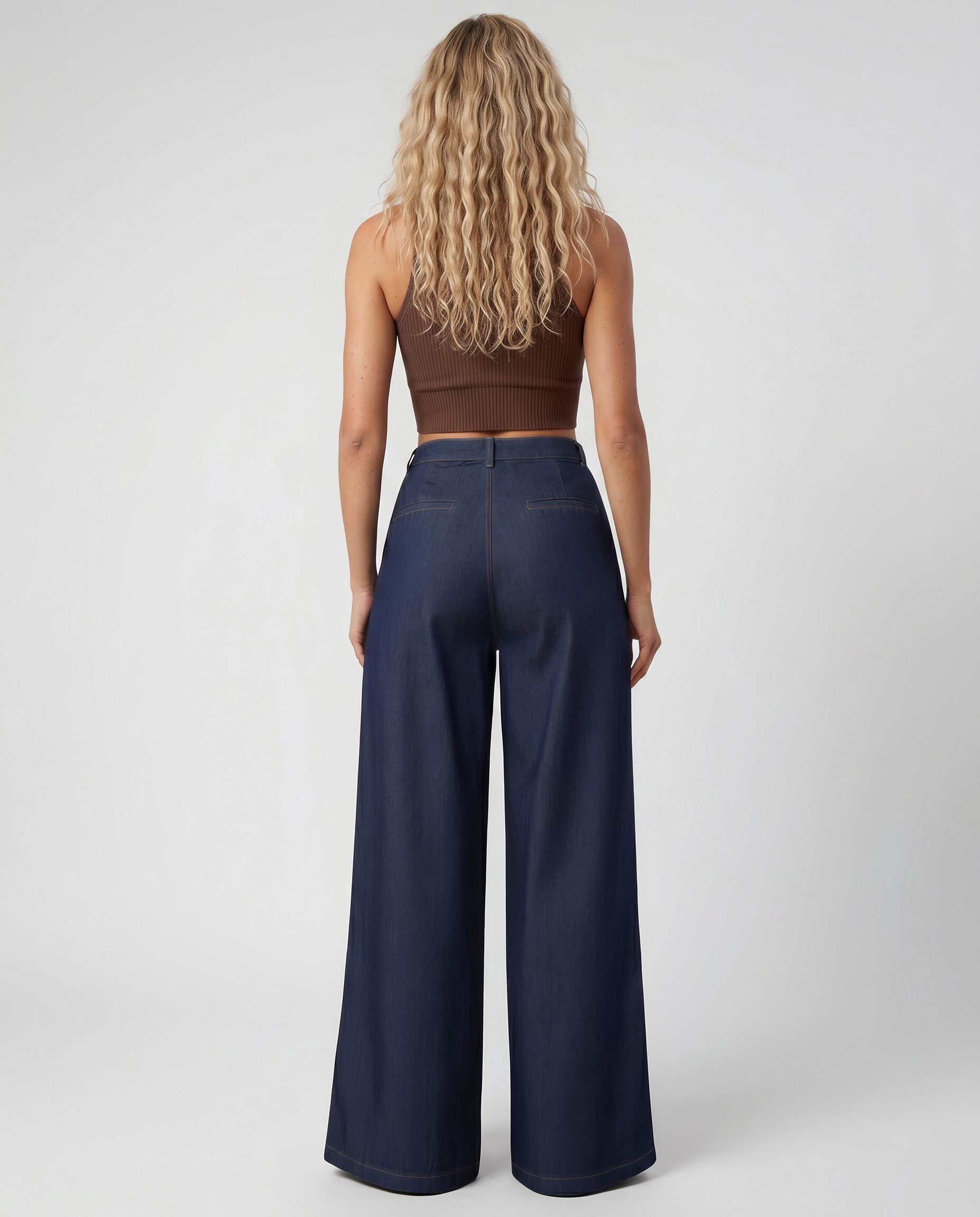 Navy denim wide-leg jeans with back yoke seam, straight wide legs, side pockets