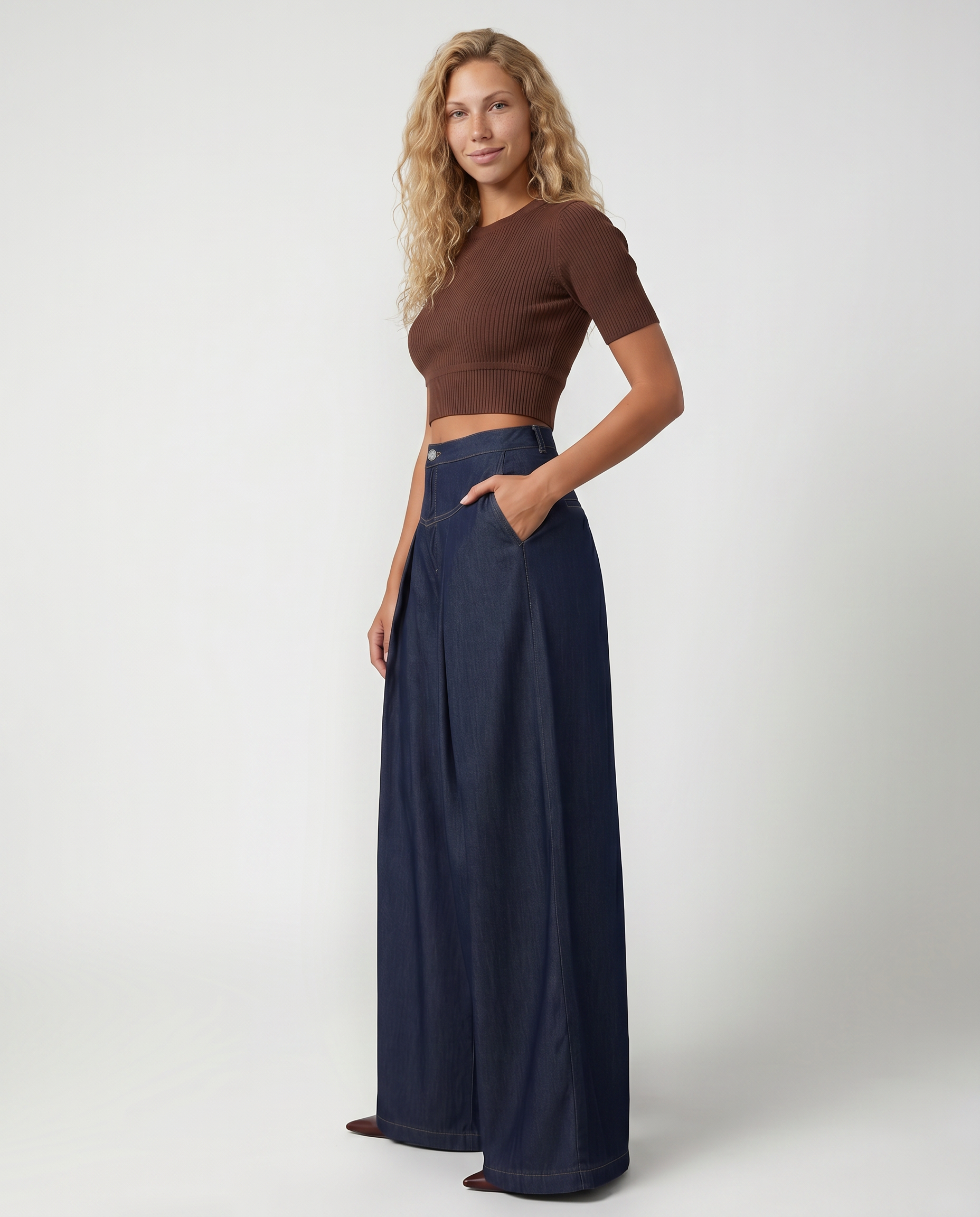 Navy denim wide-leg jeans with front pleats and wide straight leg opening