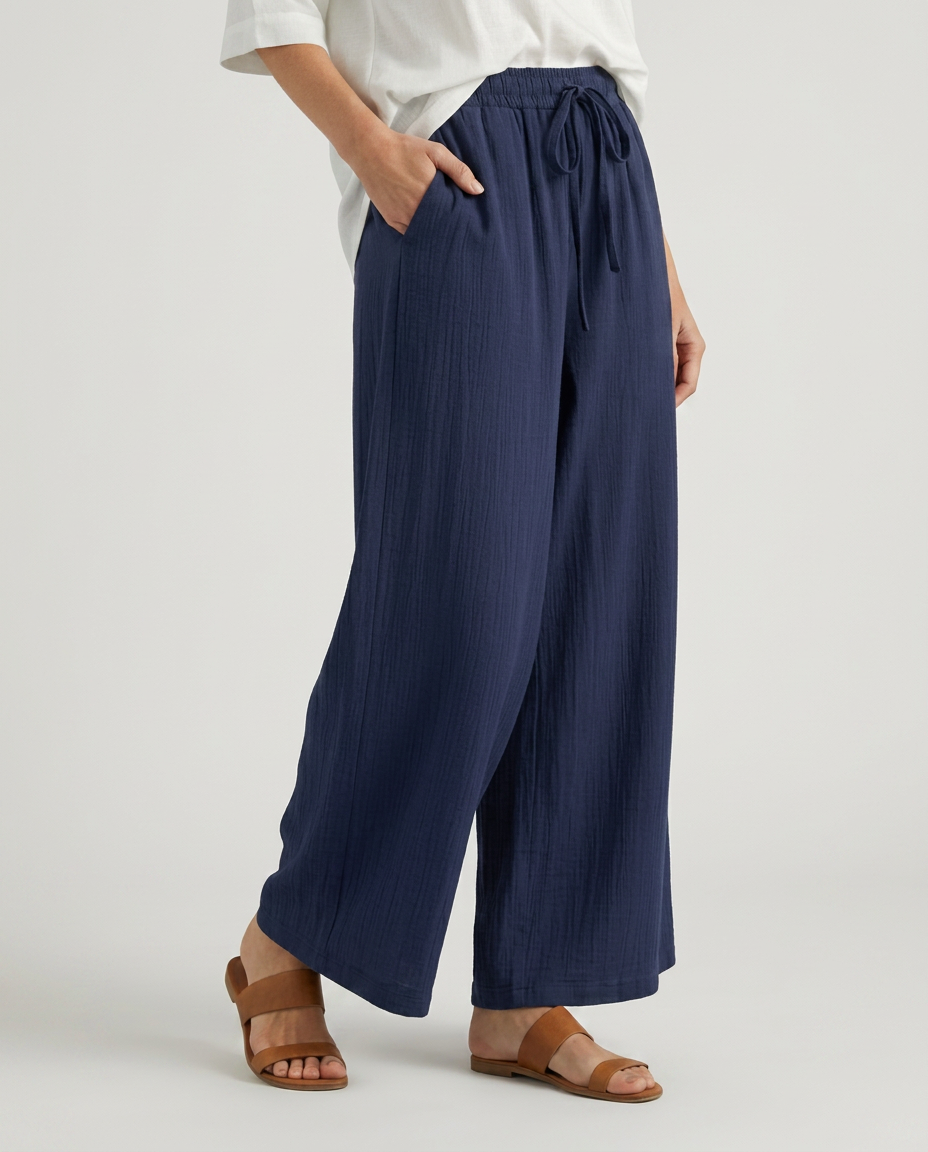Navy wide-leg drawstring trousers with tie waist and relaxed drape