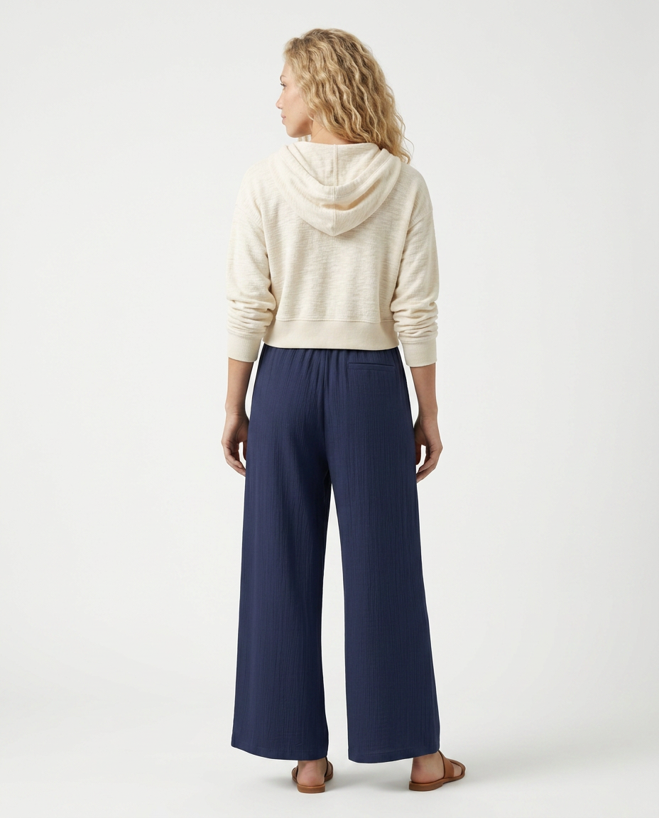 Navy wide-leg drawstring trousers, rear view with elastic waistband