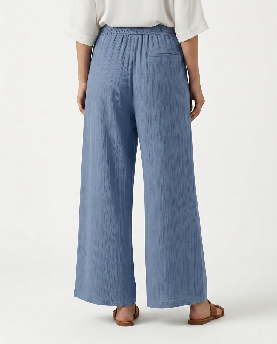 Blue wide-leg drawstring trousers with elastic waist and roomy wide pant legs