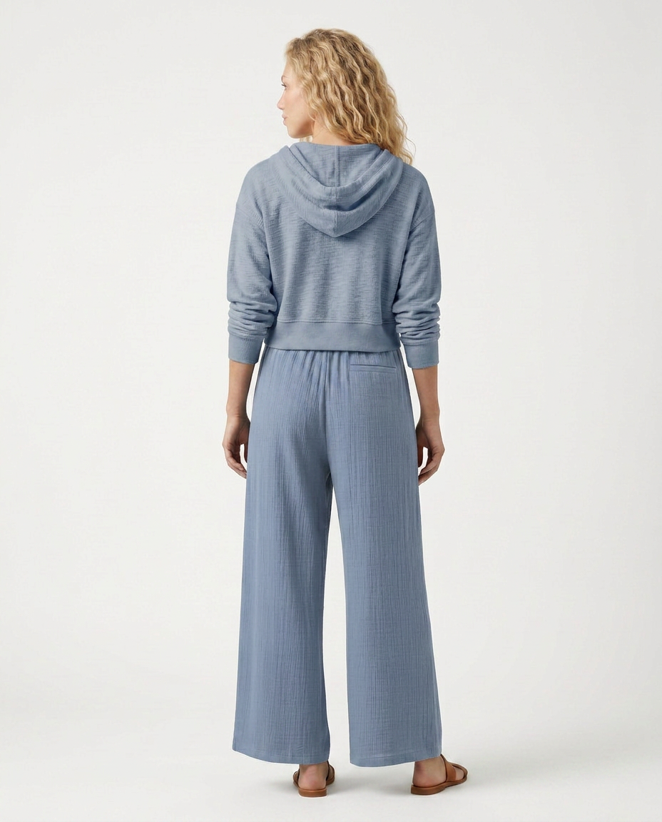 Blue wide-leg drawstring trousers with elastic waist and relaxed wide pant legs