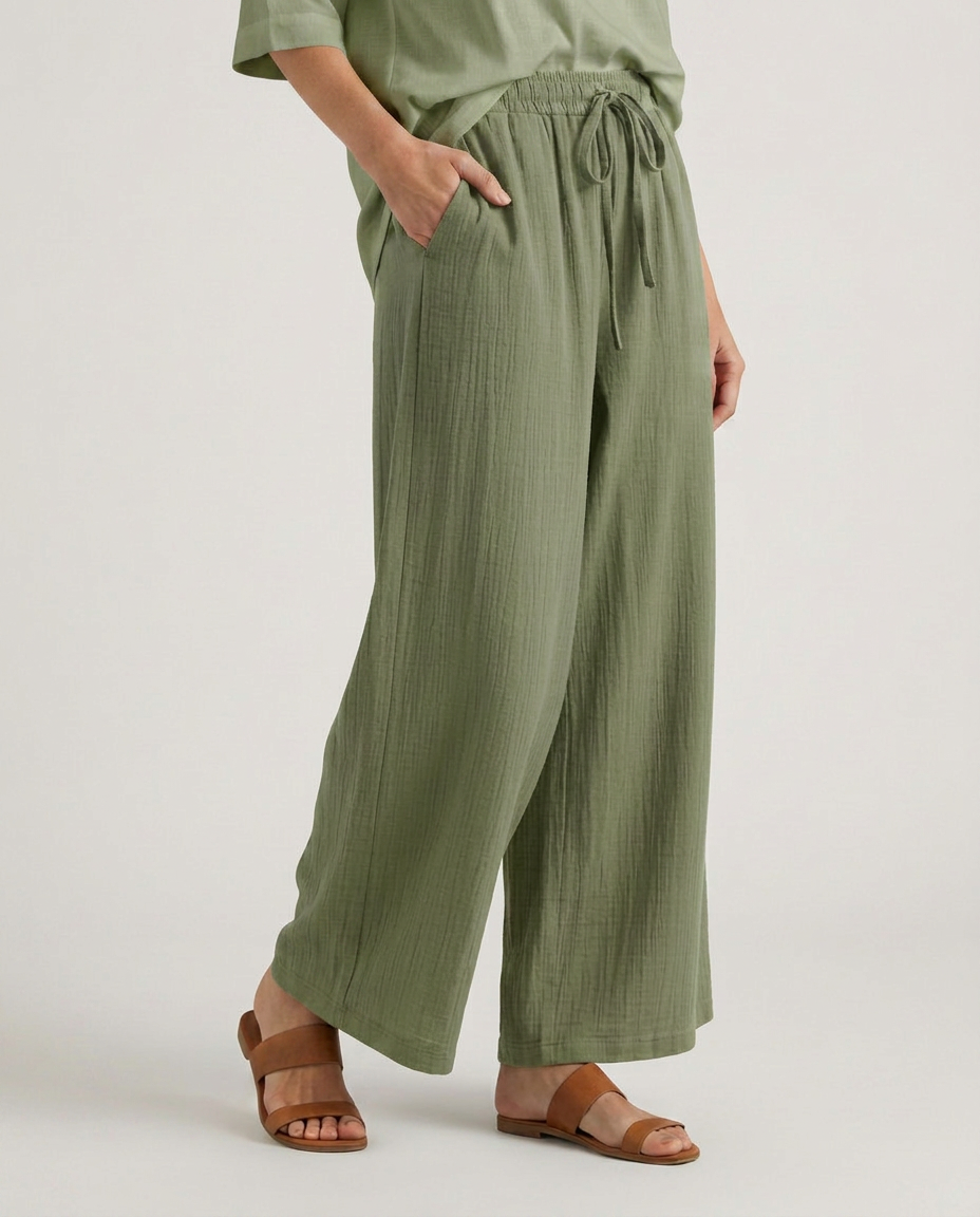 Olive green wide-leg drawstring trousers with elastic waist and tie front