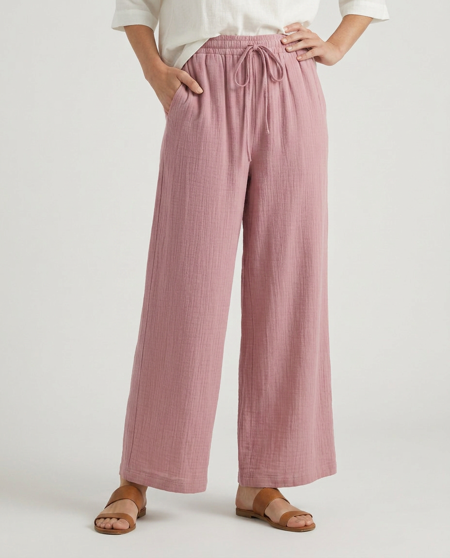Pink wide-leg drawstring trousers with elastic waist and flowy wide pant legs