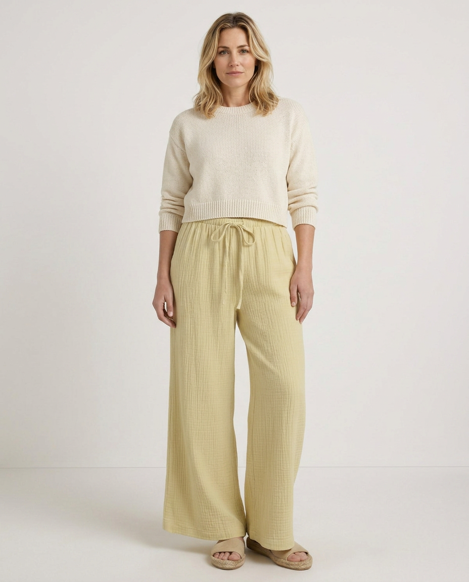 Light yellow wide-leg trousers with elastic waist and drawstring, relaxed wide leg