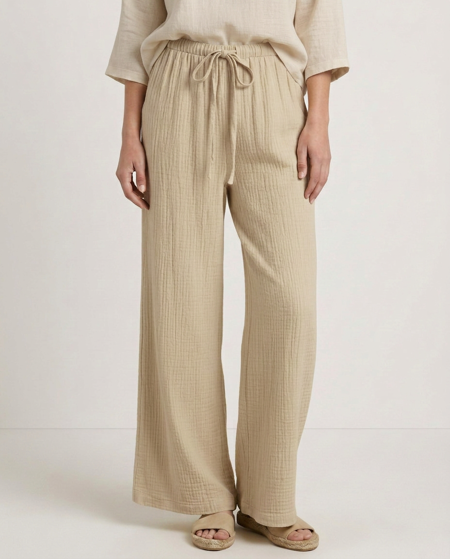 Light beige wide-leg trousers with elastic waist and drawstring
