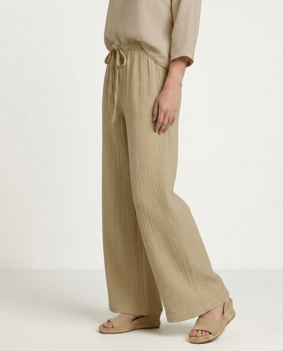 Beige wide-leg trousers with drawstring elastic waist and relaxed fit