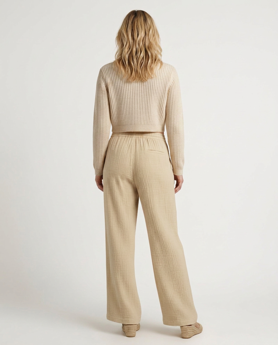 Light beige wide-leg trousers with elastic waistband and wide straight legs