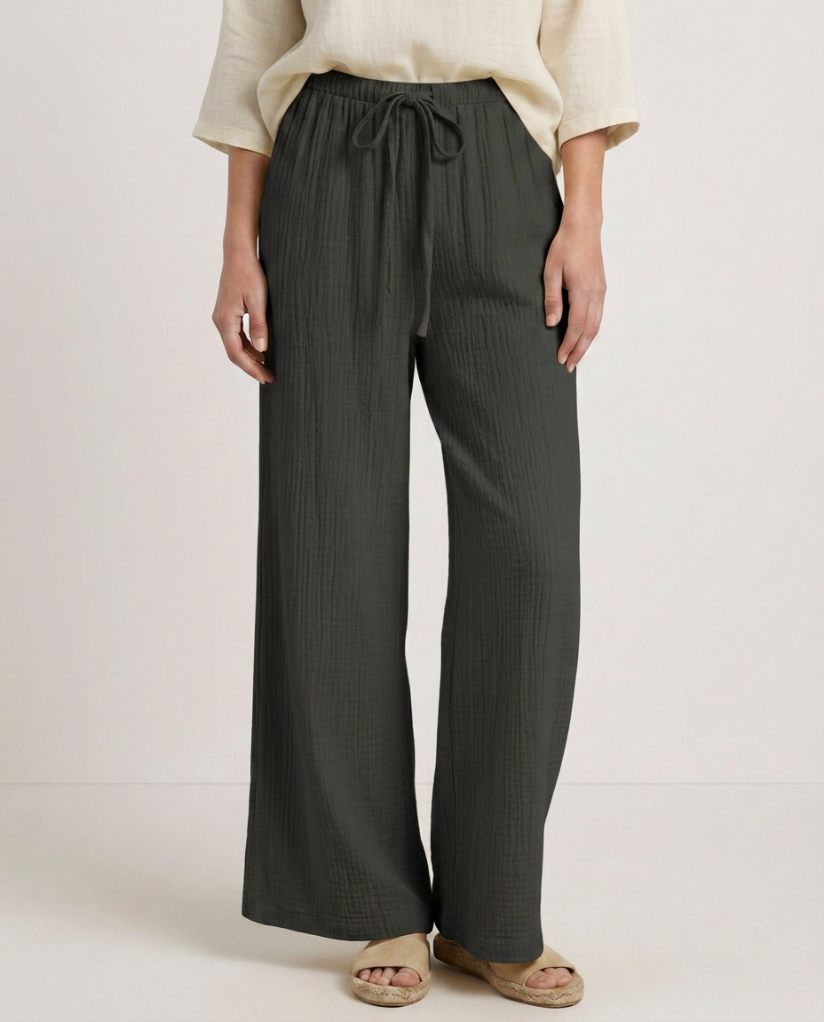 Dark charcoal wide-leg trousers with elastic waistband and drawstring ties