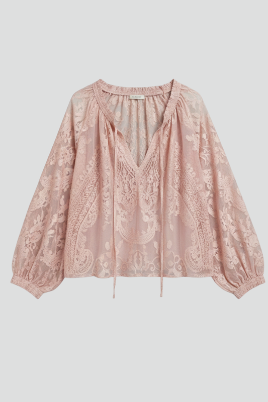 Pink lace blouse with tied V-neck, long puff sleeves, and sheer embroidered overlay
