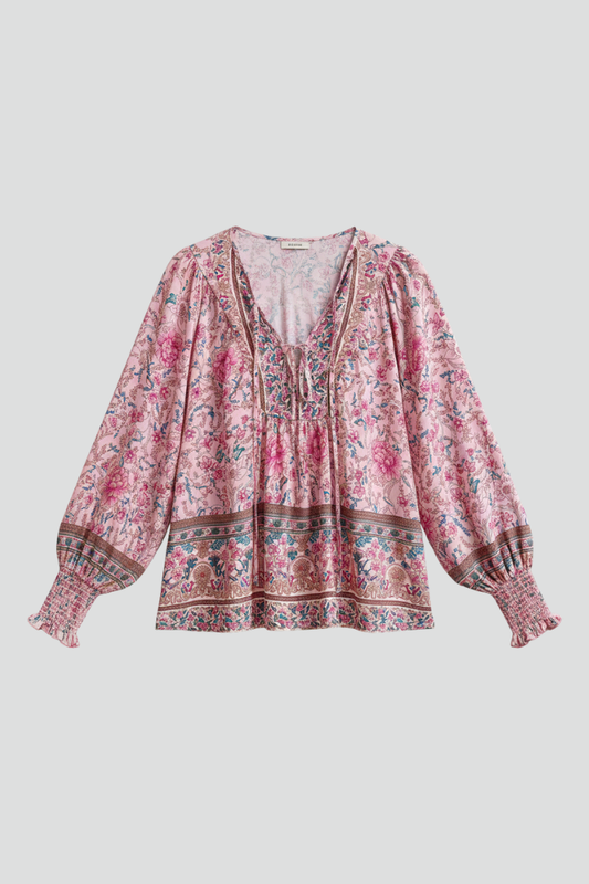Pink floral long-sleeve blouse with V-neck and gathered peasant cuffs
