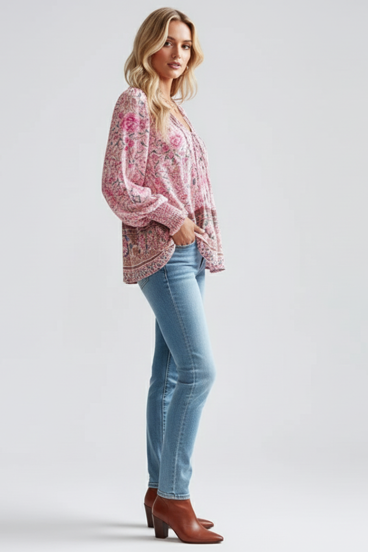Pink floral long-sleeve blouse with V-neck and gathered sleeve cuffs