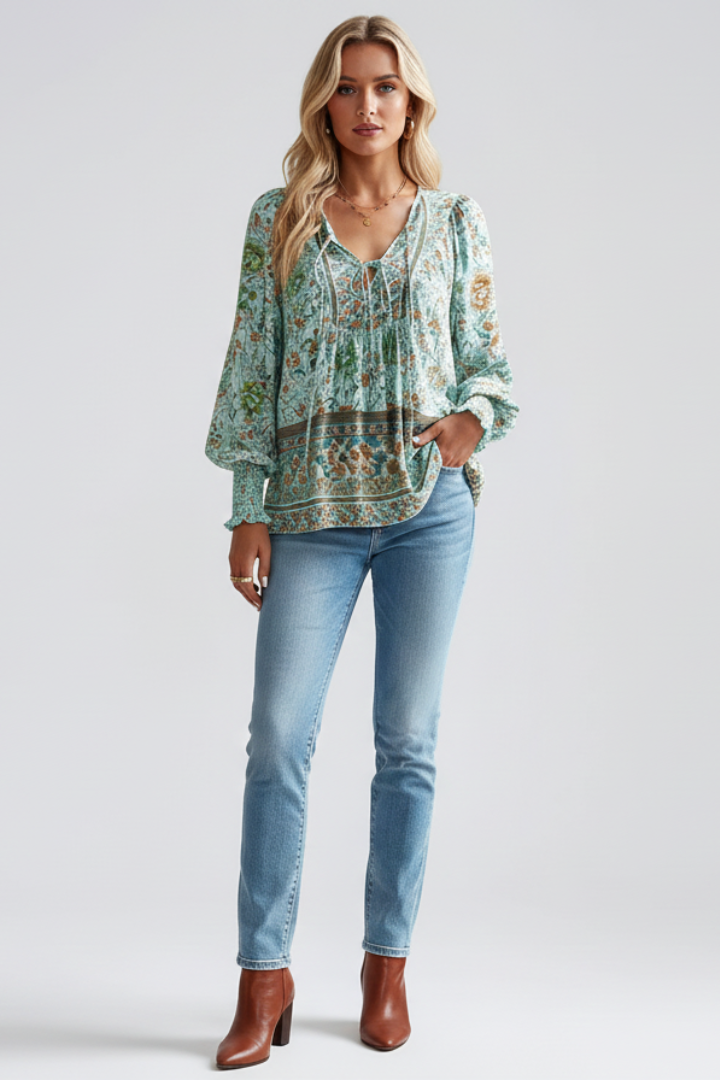 Green floral long-sleeve blouse with V-neck and gathered peasant cuffs