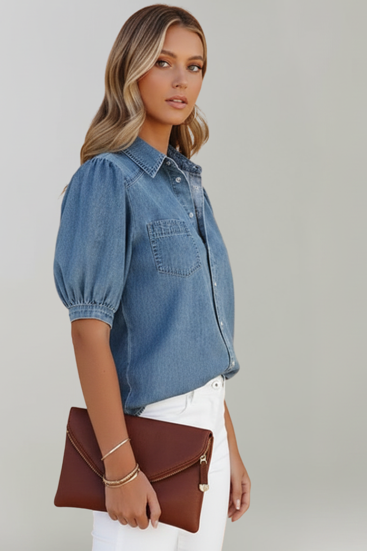 Blue denim puff-sleeve shirt with chest pocket and pointed button collar