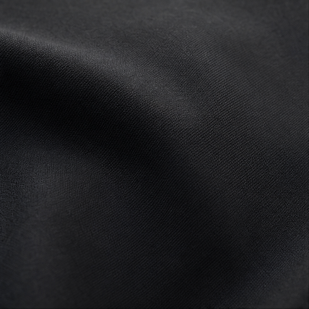 Black woven fabric texture close-up